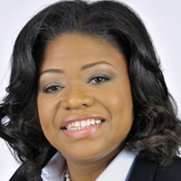 Woman smiling in a professional headshot.
