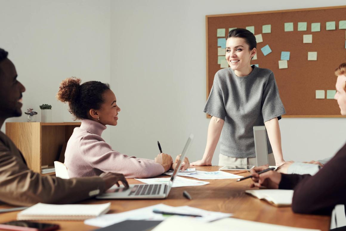 Business professional leading a work meeting