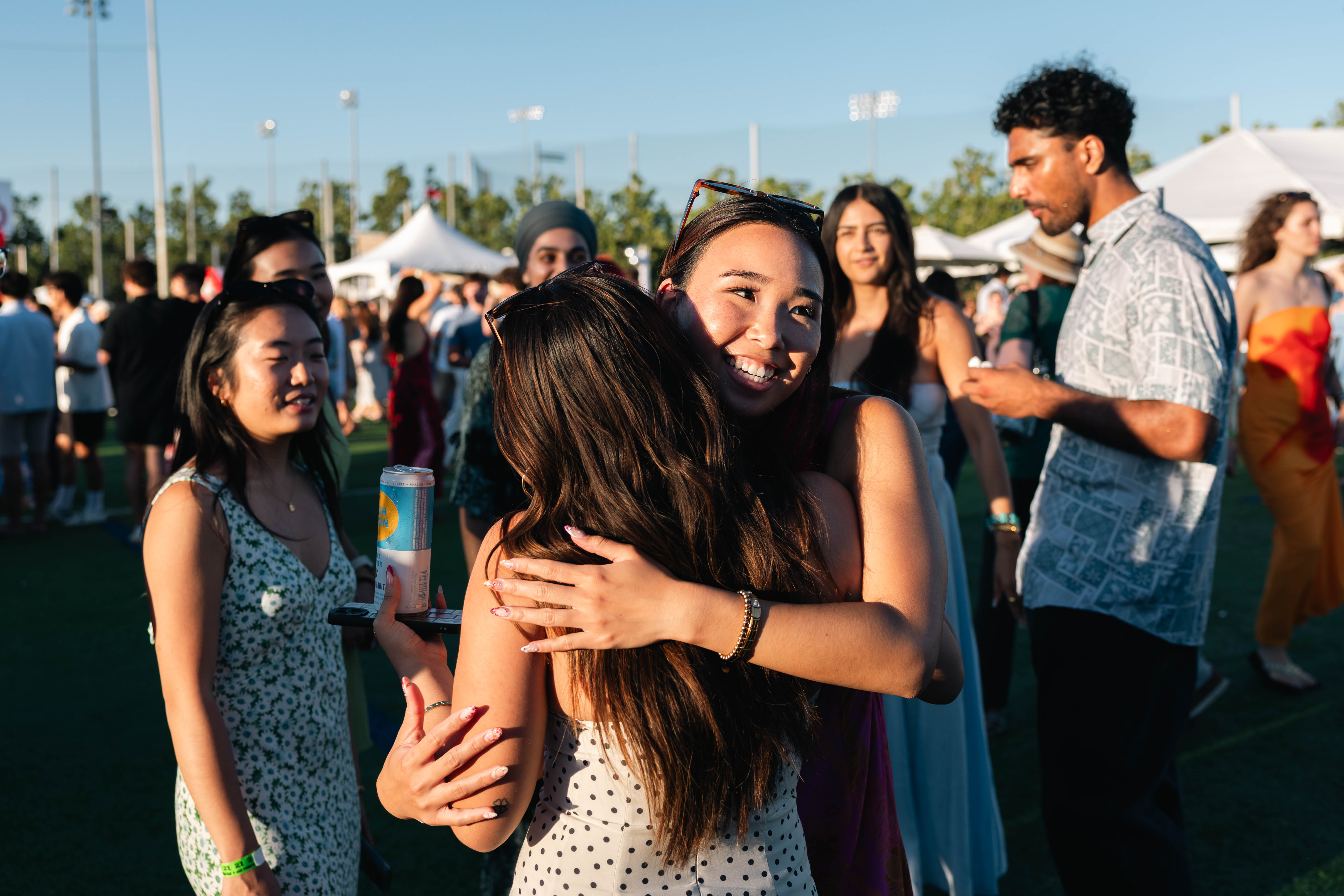 Alumni hugging