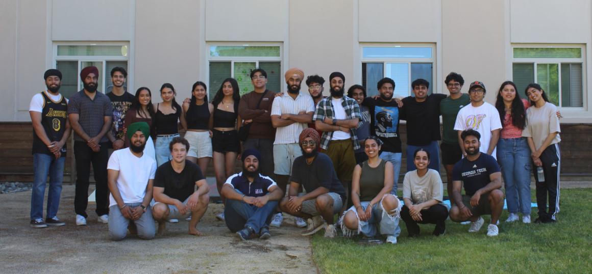 large group of students and alumni smiling