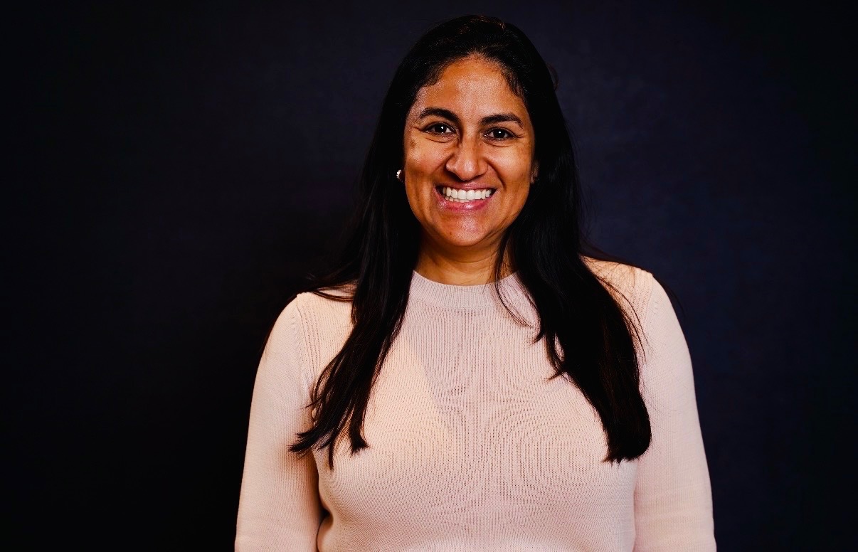 Woman Smiling At Camera