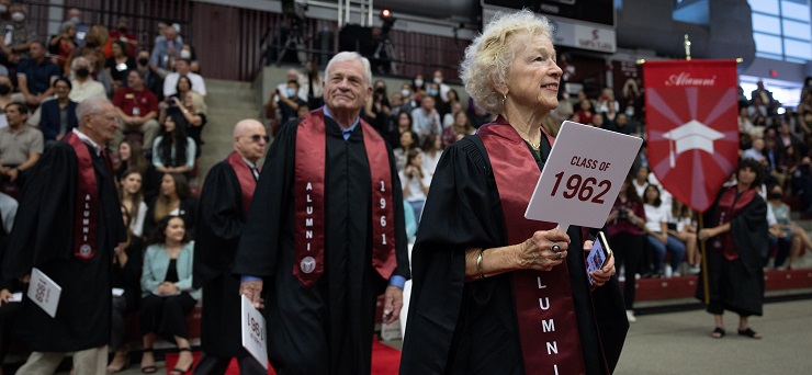 Alumni procession entering Julie Sullivans inauguration.