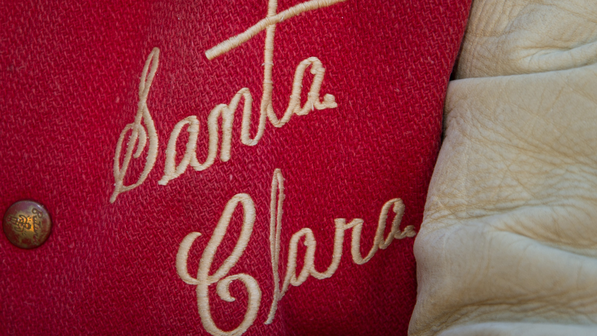 Lettermans jacket with Santa Clara spelled out in script font