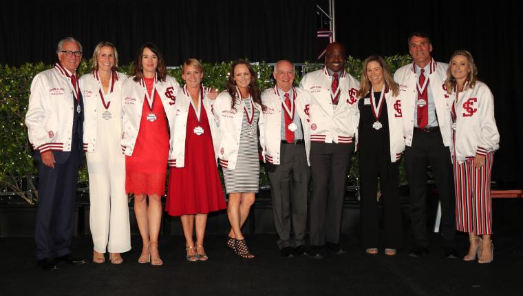 Group photo of individuals labeled as 2019 HOF Class.