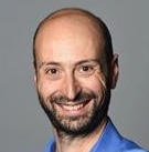 man smiles at camera 