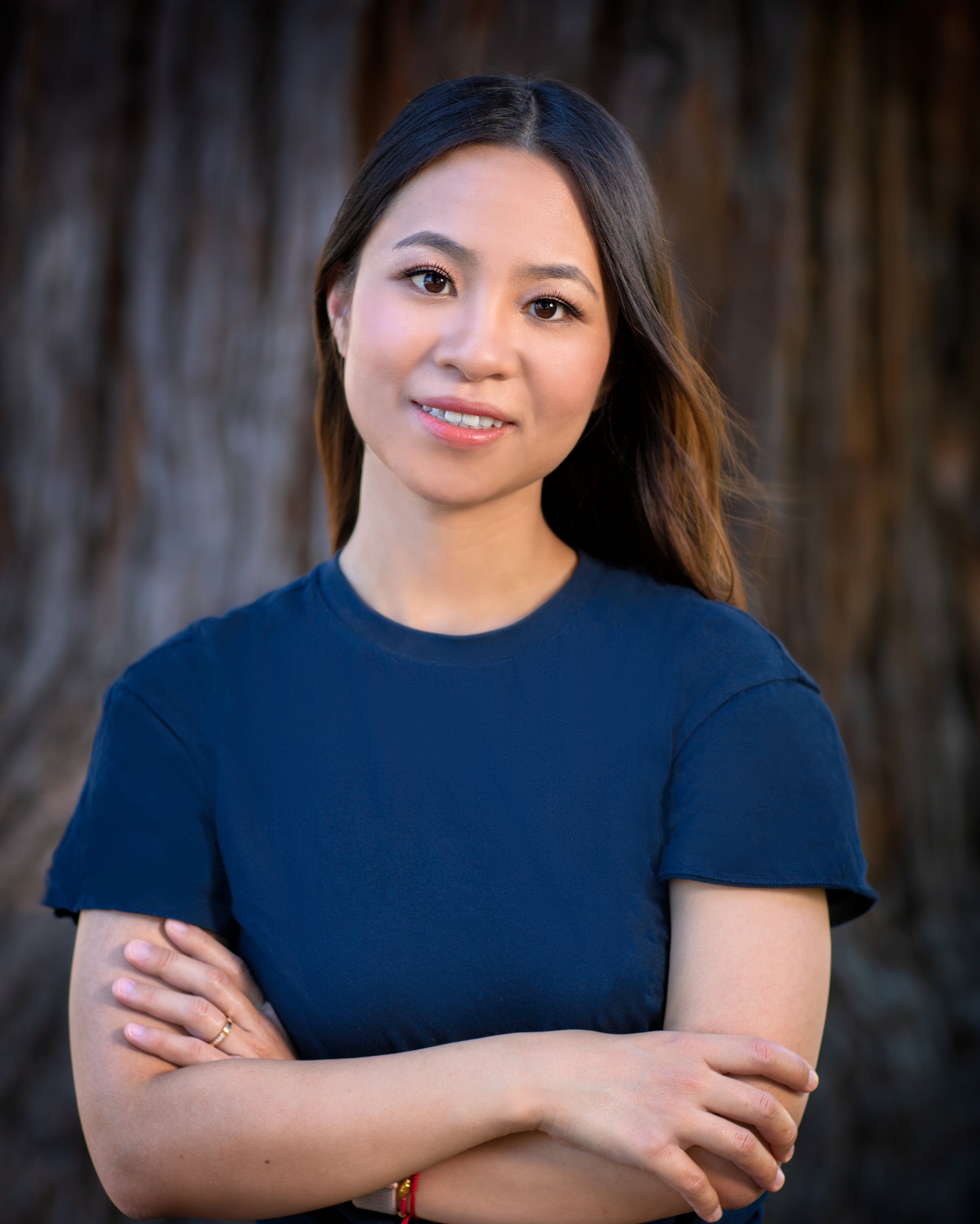 Headshot of a woman wearing blue shirt image link to story