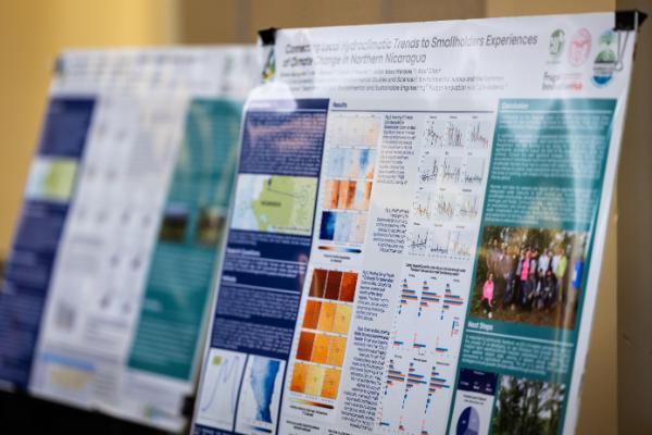 A side view of a sustainability research poster on a stand text not legible 