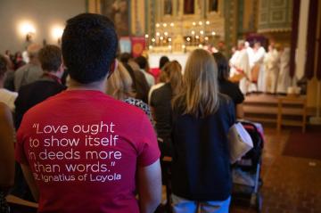 Broncos attending mass at the Santa Clara Mission Church