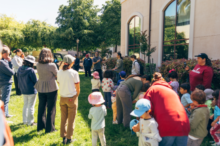 Arbor Day 2026: Group standing around speakers at the ceremony