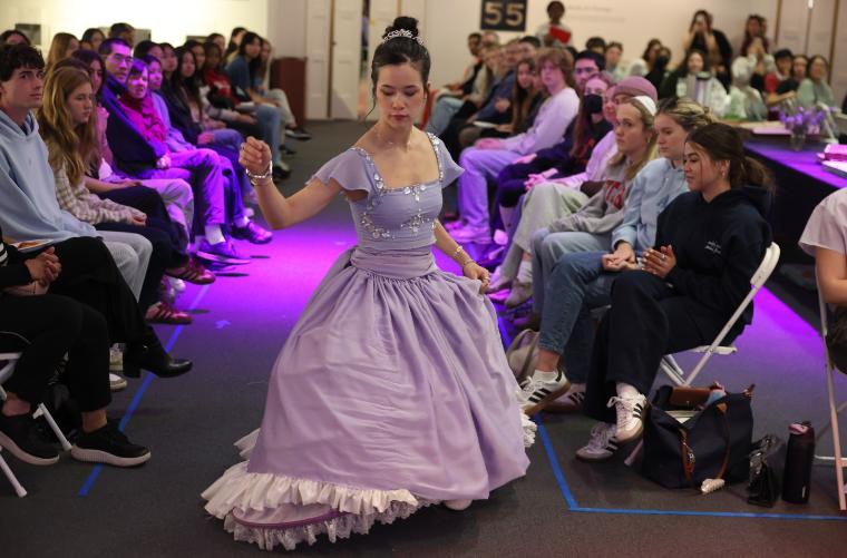 EcoFashion Show 2026: Model on runway wearing a princess dress doing a curtsey