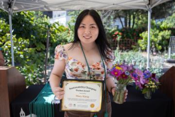 2025 Sustainability Celebration: A student poses with her award. image link to story