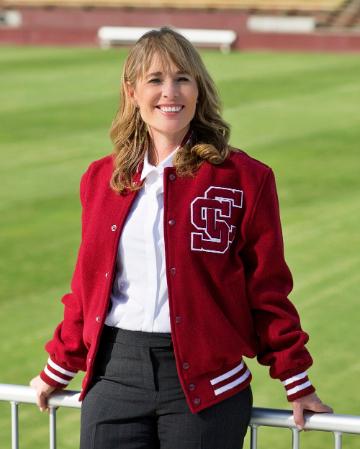 A woman in a red Santa Clara University lettermans jacket