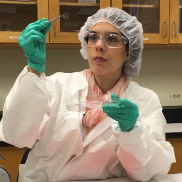 Laura Rivas Yepes, M.S. 20 in a bioengineering lab image link to story