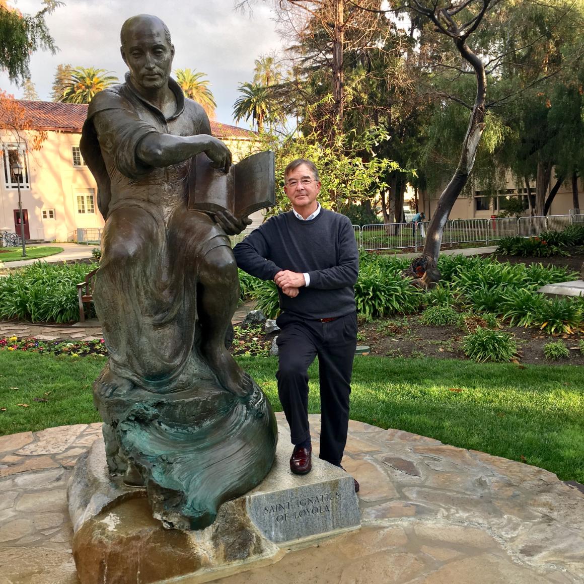 Lanny Vincent with SCUs statue of St. Ignatius image link to story