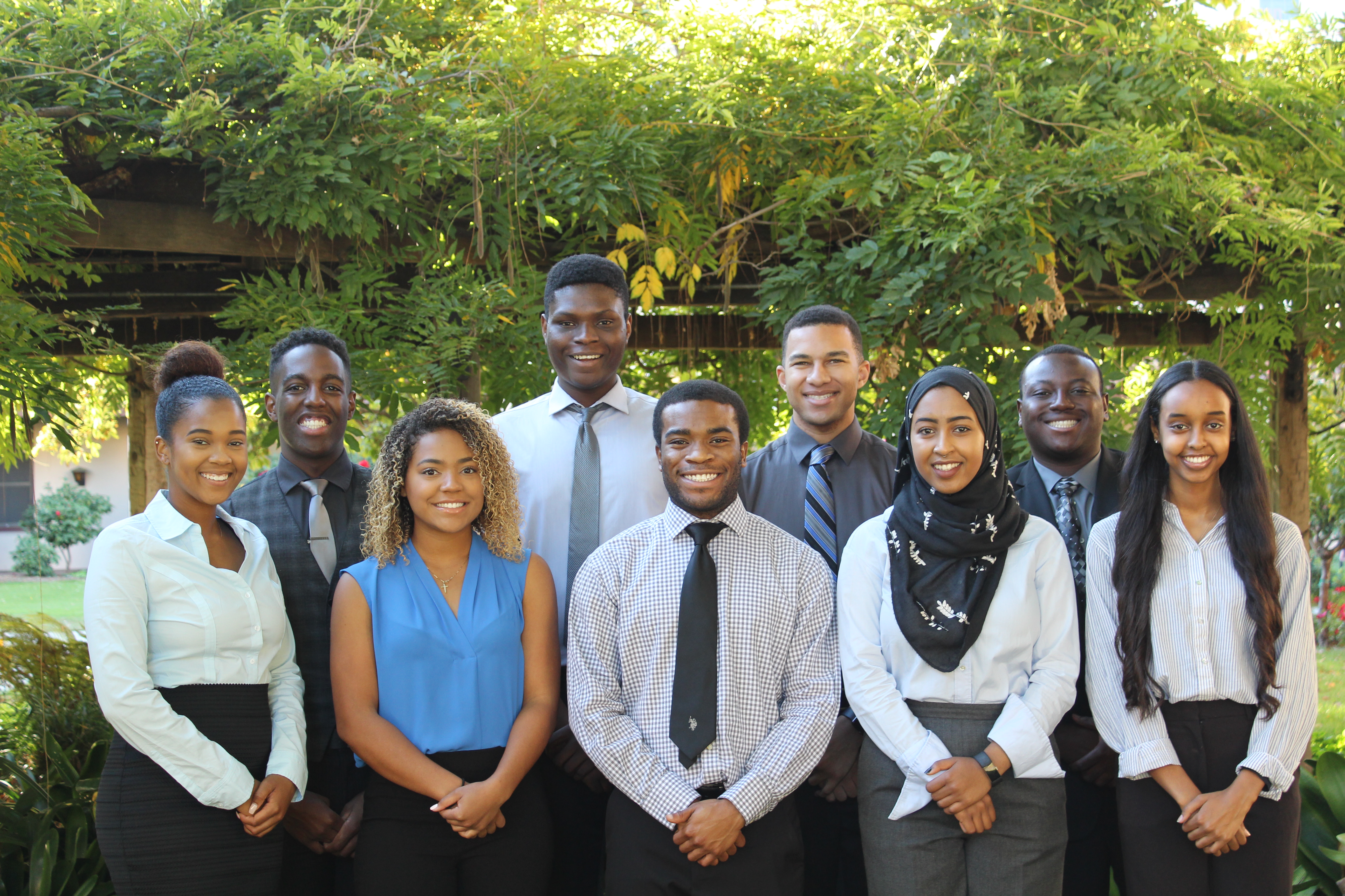 Group of people posing outdoors, titled NSBE 2017-2018 Executive Board.