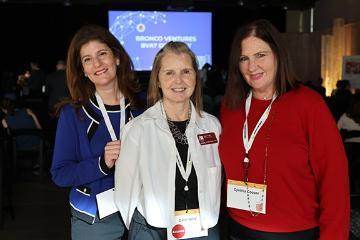 Three women from Ciocca Center at Demo Day 2025 event